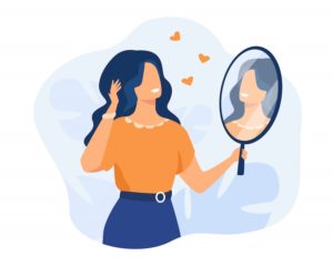 femme se regarde dans miroir